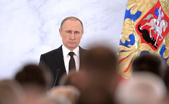 Президент России Владимир Путин во время выступления с ежегодным Посланием к Федеральному Собранию России в Кремле. Декабрь 2015 года


