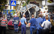 На месте взрыва автомобиля, за рулем которого находился Павел Шеремет. 20 июля 2016 года


