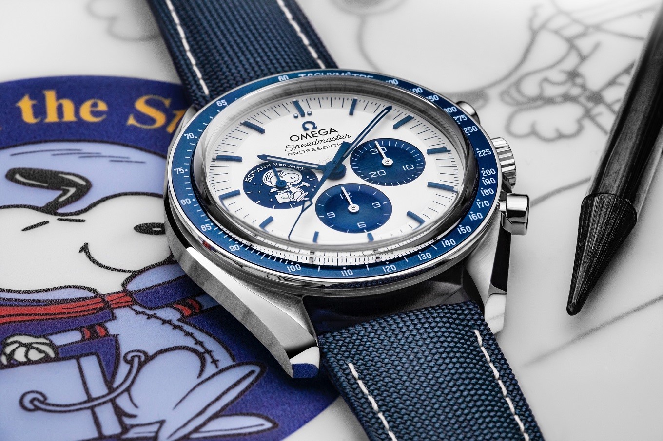 Компания OMEGA представляет новую модель Speedmaster Silver Snoopy Award