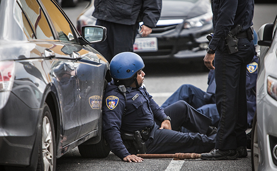 Полицейские во время беспорядков в городе Балтимор