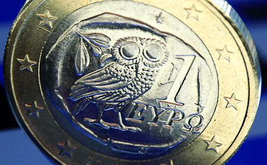 Греческая монета в 1 евро.