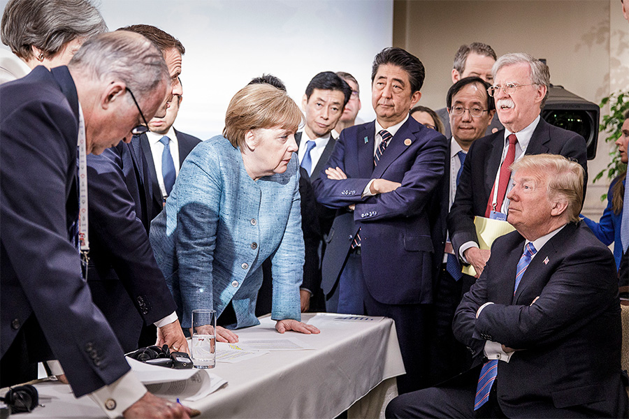 A handout photograph from the German government shows a group of leaders at the Group of Seven summit, including German Chancellor Angela Merkel and President Trump, in Canada on June 9.