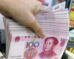 ОЭСР: Китай должен сам принимать решения относительно юаня