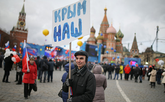 Участник митинга-концерта &laquo;Мы вместе&raquo;, посвященного годовщине воссоединения Крыма с Россией. 18 марта 2016 года


