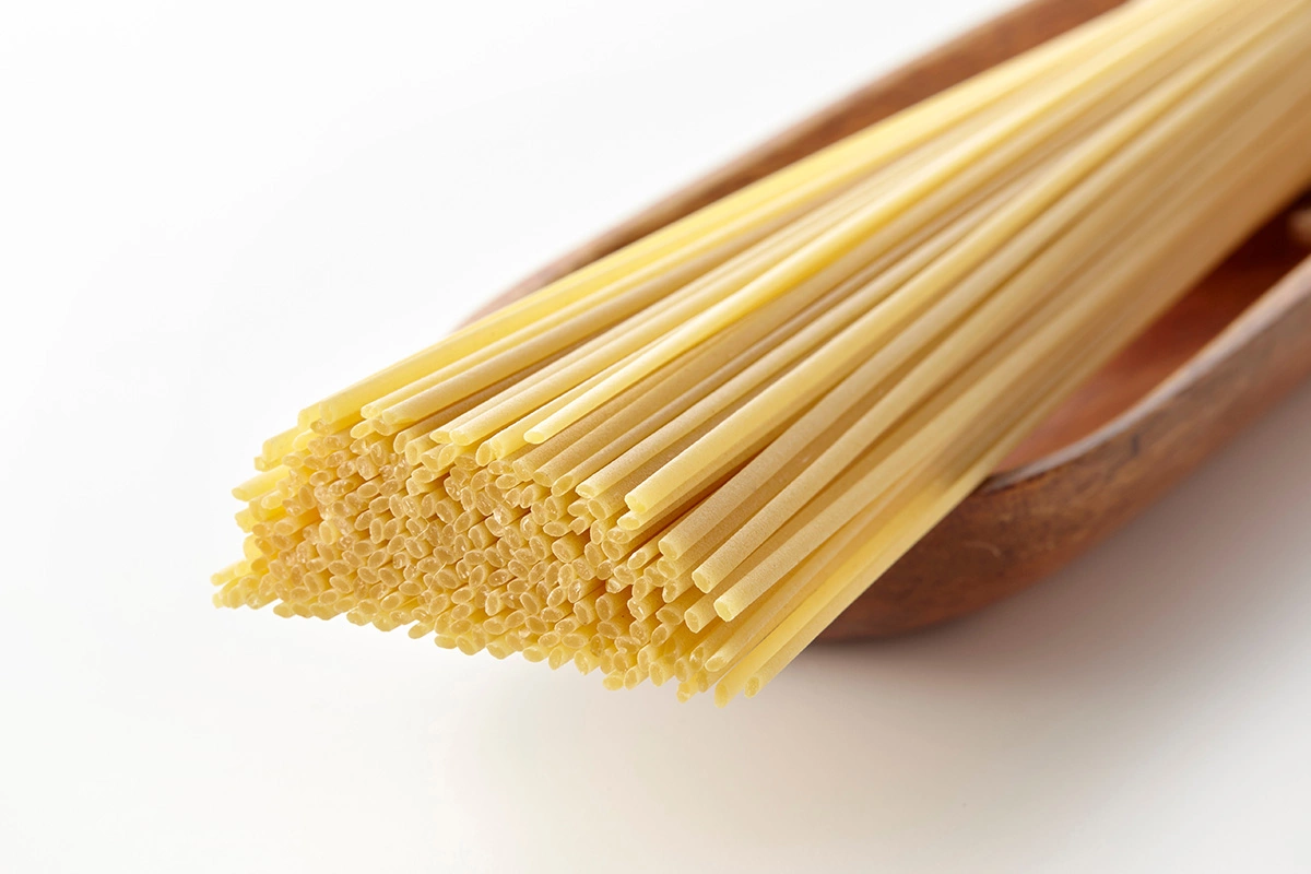 Название происходит от итальянского linguine, «маленькие язычки»