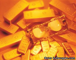 Цена золота на COMEX продолжила снижаться