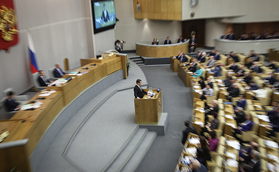 Премьер-министр РФ Дмитрий Медведев во время выступления с отчетом о результатах деятельности правительства РФ за 2014 год