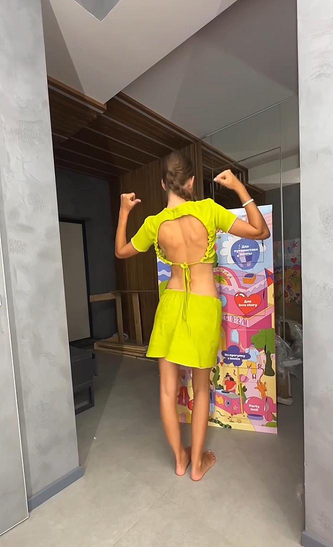 Шкаф, заполненный одеждой от бренда Macrocosm