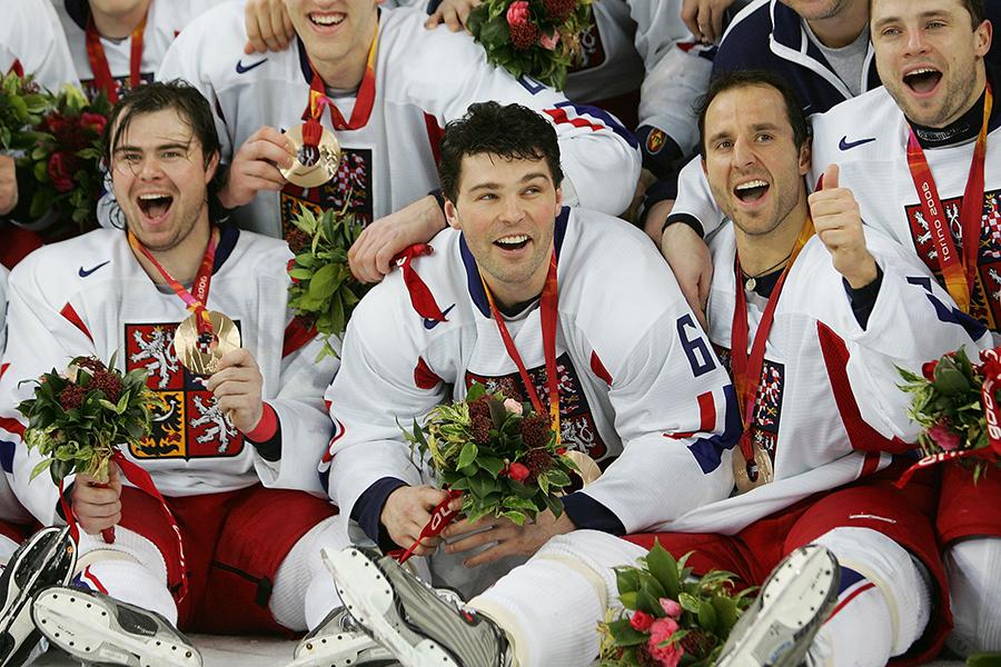 
TURIN, ITALY - FEBRUARY 25: Jaromir Jagr #68 of Czech Republic (C), Jaroslav Spacek #6 (L), and Martin Rucinsky #26 of Czech Republic celebrate after receiving the bronze medal after their 3-0 win over against Russia and Czech Republic during Day 15 of the Turin 2006 Winter Olympic Games on February 25, 2006 at the Palasport Olimpico in Turin, Italy.&nbsp;
&nbsp;