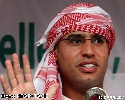 Сын М.Каддафи раздает оружие сторонникам изгнанного ливийского лидера