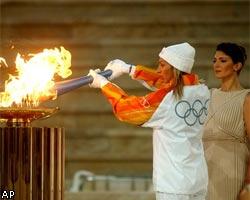 Олимпийский огонь покидает Грецию