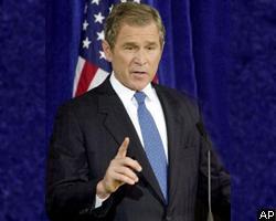 Буш выдает ваучеры школьникам