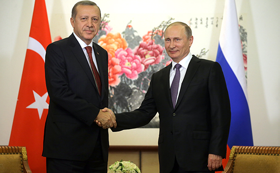 Президент Турции Реджеп Эрдоган и президент России Владимир Путин во время встречи в Китае


