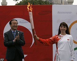 Олимпийский огонь прибыл в Россию