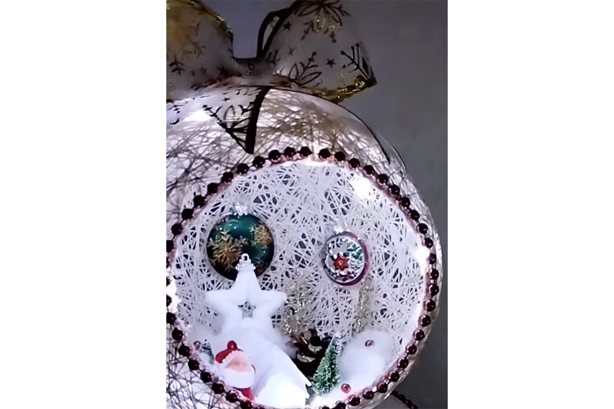 Снежный шар из пряжи