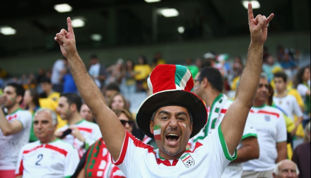 Иранские фанаты во время матча в Группе F Иран - Нигерия. 16 июня, Куритиба, Бразилия.  © gettyimages.com