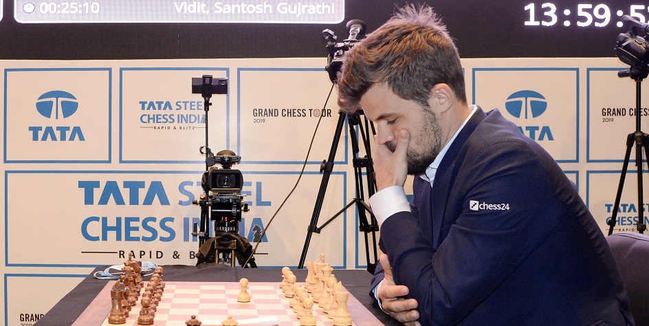 Действующий чемпион мира по классическим шахматам, рапиду и блицу Магнус Карлсен