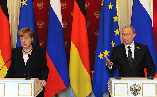 Президент России Владимир Путин и канцлер Германии Ангела Меркель во время пресс-конференции по итогам двусторонней встречи в Кремле