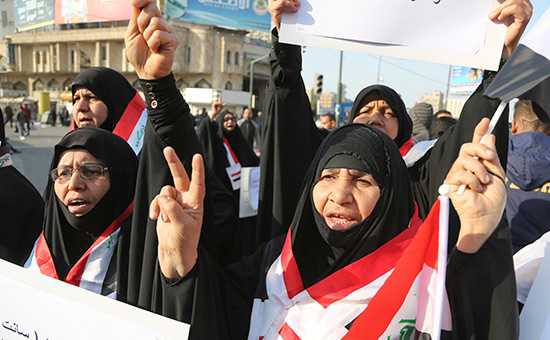 Участники митинга против иммиграционных запретов Дональда Трампа в Багдаде


