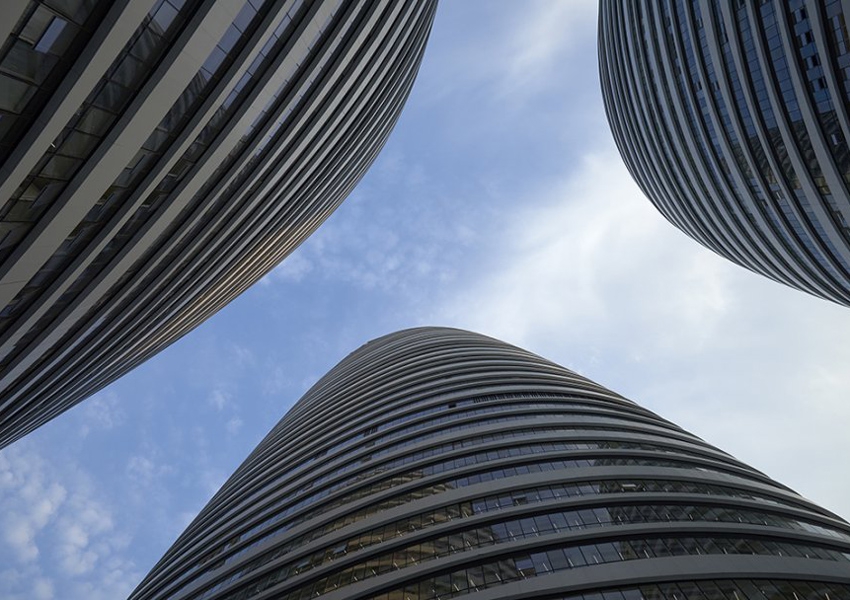 В Пекине построили небоскребы без углов по проекту Захи Хадид