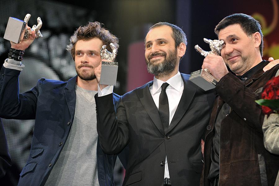 Сергей Пускепалис, Алексей Попогребский и Григорий Добрыгин во время церемонии награждения за фильм «Как я провел этим летом», 2010 год