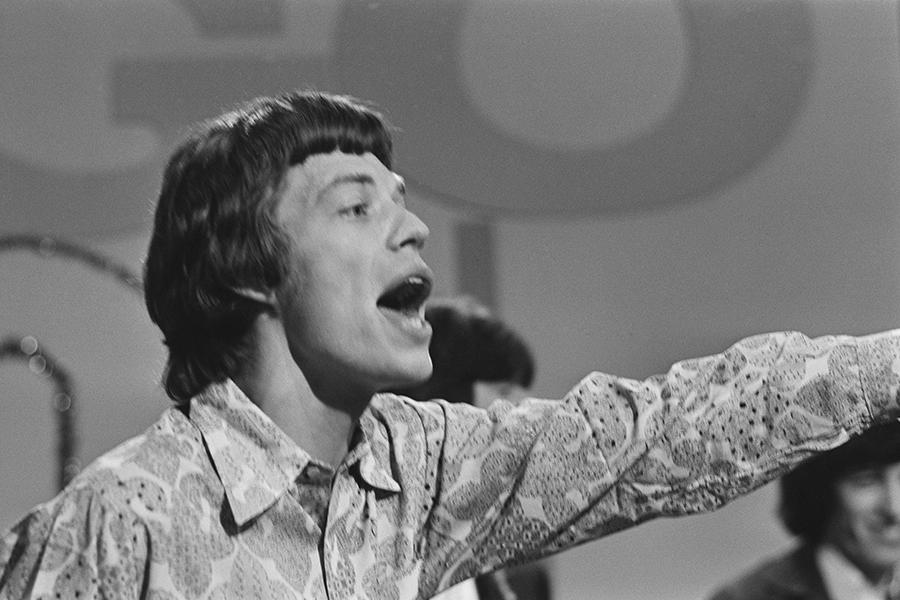 Мик Джаггер во время выступления, 1966 год