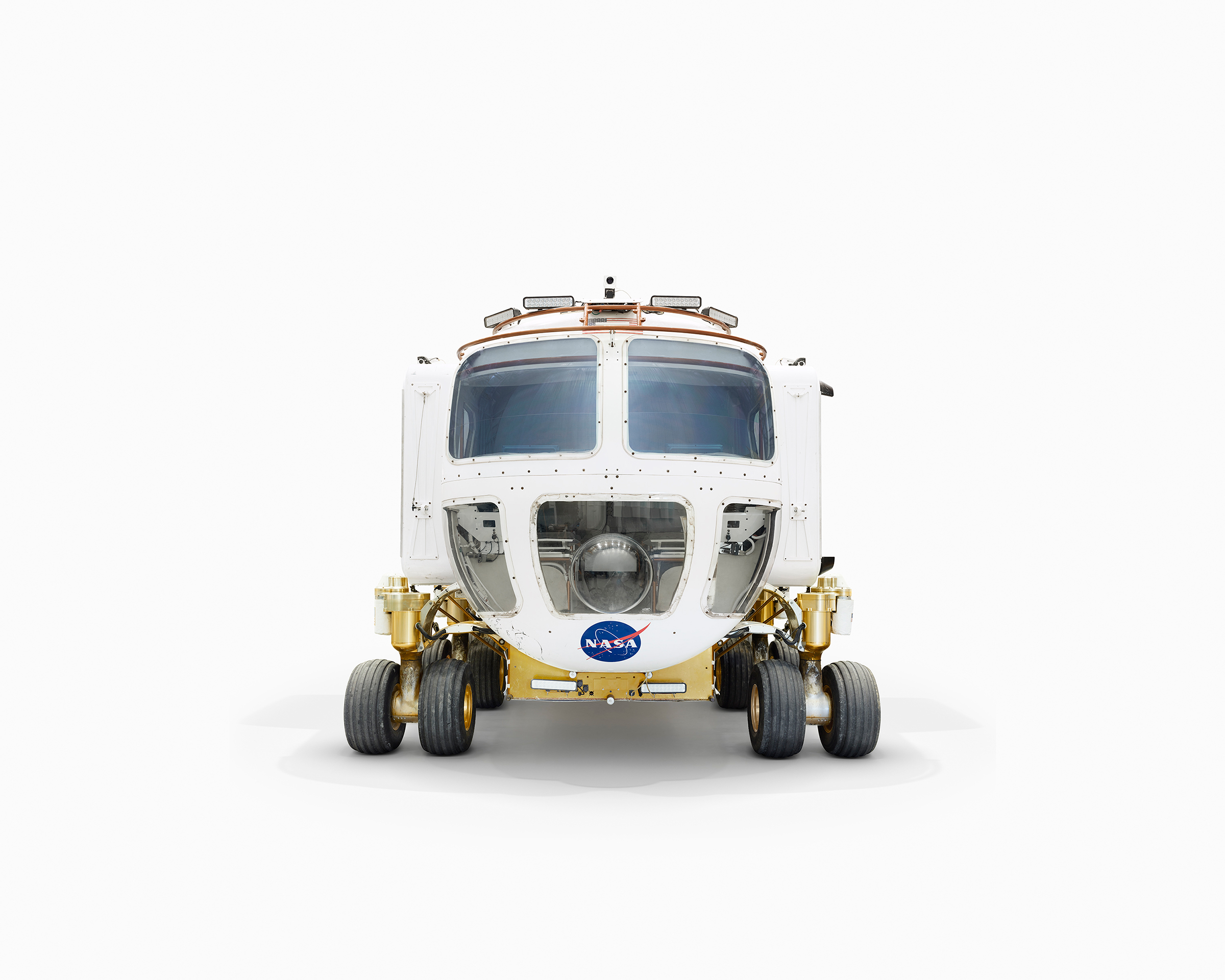 Прототип лунного транспортного вездехода &mdash; это небольшой 12-колесный транспортер. Работает от аккумуляторов, заряда которых хватает на две недели работы, и может развивать скорость до 19 км/ч.
