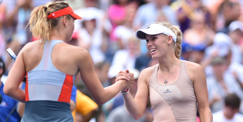 Каролин Возняцки (справа) победила Марию Шарапову в четвертом круге US Open-2014.