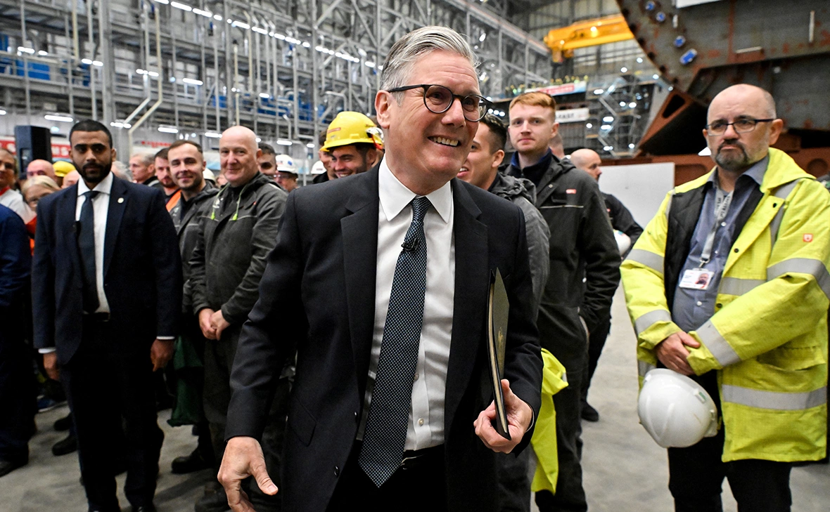 Andy Buchanan / Reuters