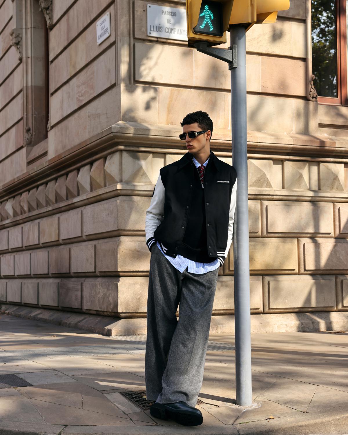 Куртка Sprayground, джемпер Emporio Armani, рубашка Seventy, брюки Iceberg, очки Retrosuperfuture, ботинки Principe di Bologna