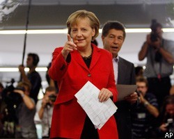 А.Меркель принимает поздравления с победой на выборах