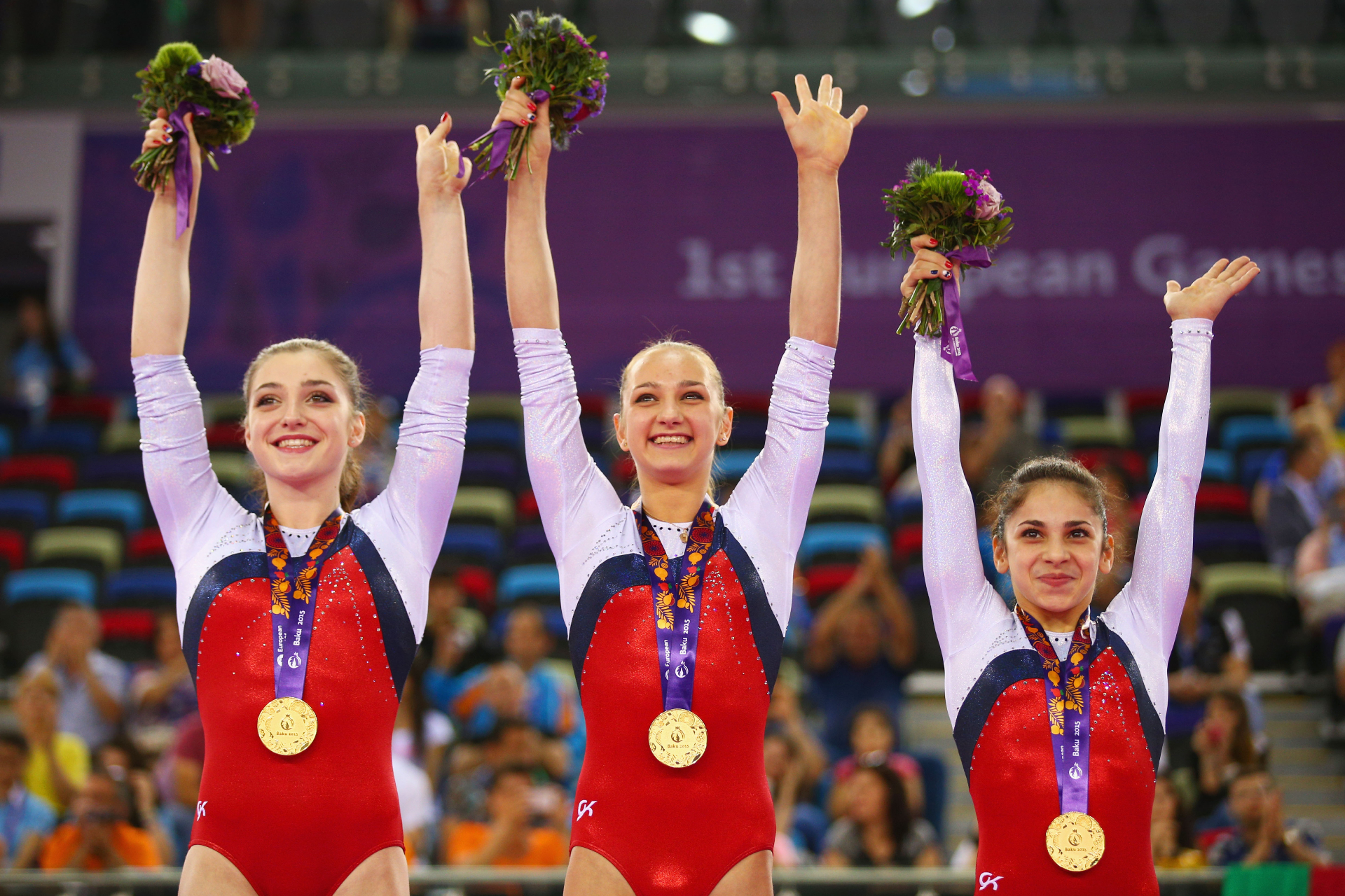 Российские гимнастки Алия Мустафина, Виктория Комова и Седа Тутхалян на Европейских играх в Баку, 2015