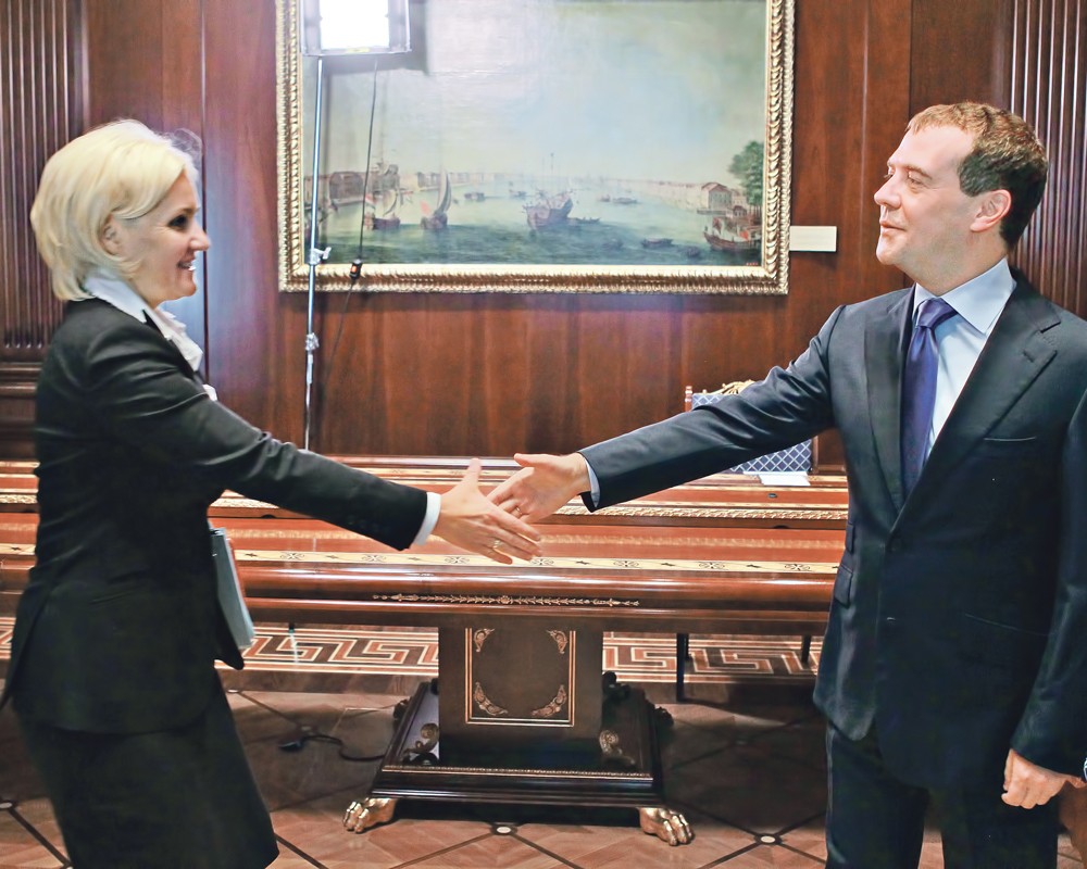 Социальный вице-премьер Ольга Голодец(слева) и премьер Дмитрий Медведев(справа)
