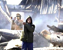 Сторонники М.Каддафи атаковали посольства США и Британии