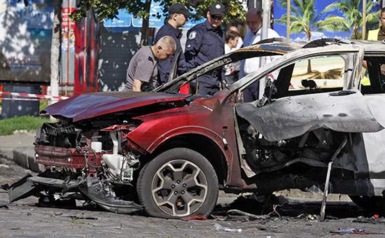 На месте взрыва автомобиля, в котором находился журналист Павел Шеремет, в Киеве



