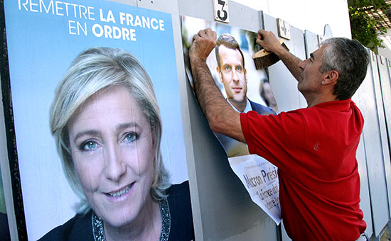 Предвыборные плакаты Марин Ле Пен&nbsp;и&nbsp;Эмманюэля Макрона&nbsp;


