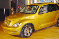 Золотой Chrysler PT Cruiser