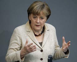 А.Меркель поддержала не только евро, но и главу ЕЦБ