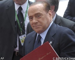 С.Берлускони заявил, что должен остаться на посту премьера для спасения Италии