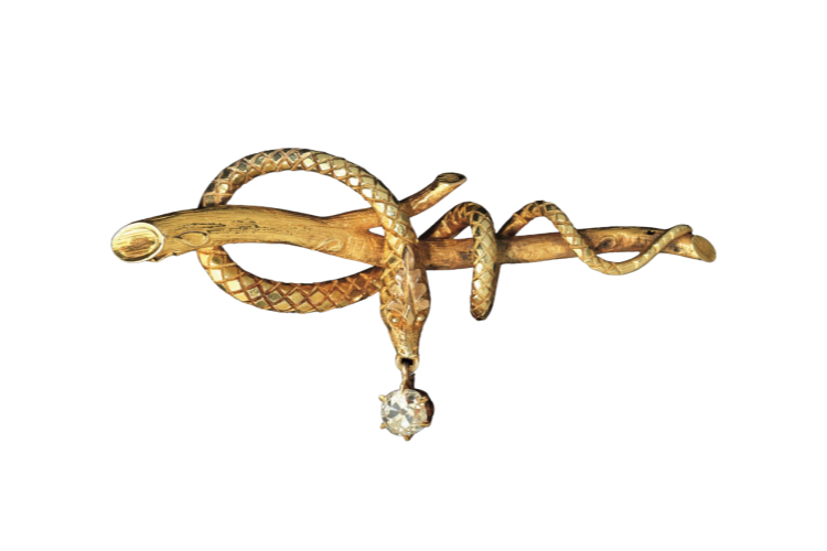 Брошь в виде змеи, надетая на встречу с представителями Ирака. 18-каратное золото с бриллиантом. Неизвестный дизайнер, США, приблизительно 1860 год