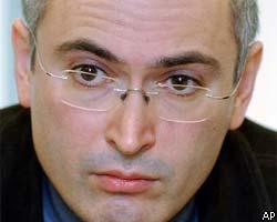 Эксперты об отставке М.Ходорковского
