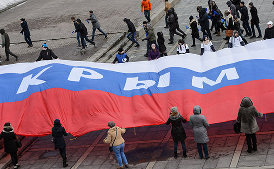 Во время митинга, приуроченного ко&nbsp;второй годовщине подписания договора о&nbsp;вхождении Крыма и&nbsp;Севастополя в&nbsp;состав РФ
