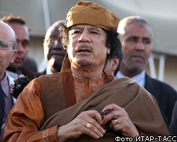 Ливийское телевидение показало тела убитых родных М.Каддафи