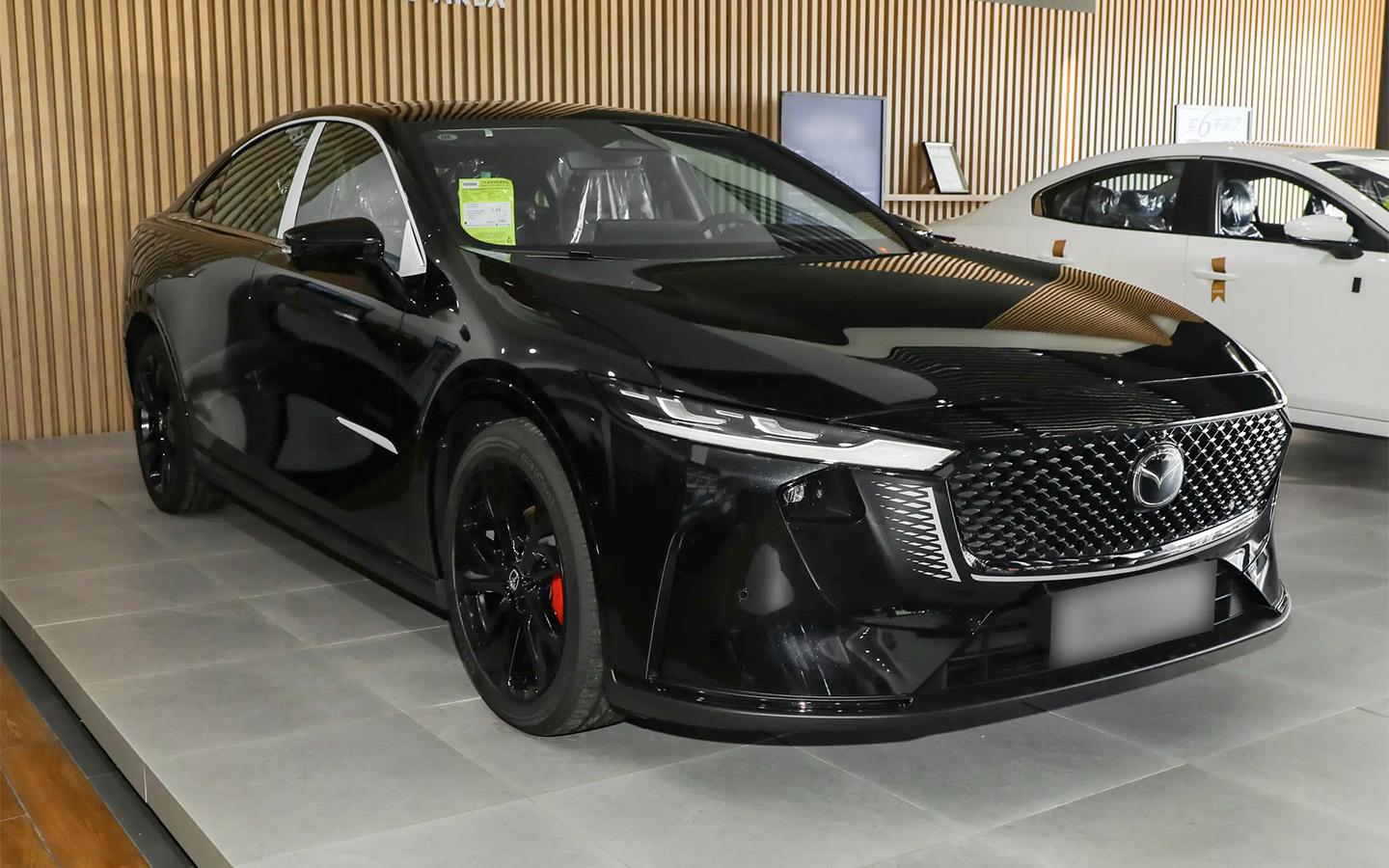 Дилеры начали продавать Mazda EZ-6 в России. Фото, цены и характеристики