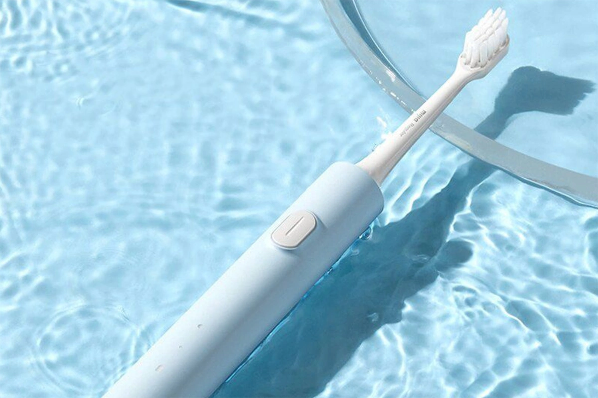 Электрическая зубная щетка