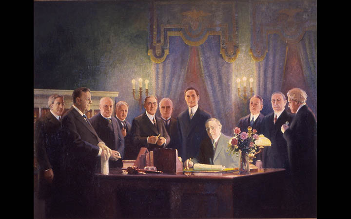 Президент Вудро Вильсон подписывает Закон о Федеральной резервной системе, картина Уилбурга Г. Курца