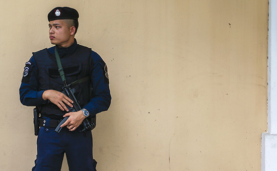 Сотрудник тайской полиции


