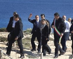 С.Берлускони грозит ЕС скандалом из-за тунисских беженцев