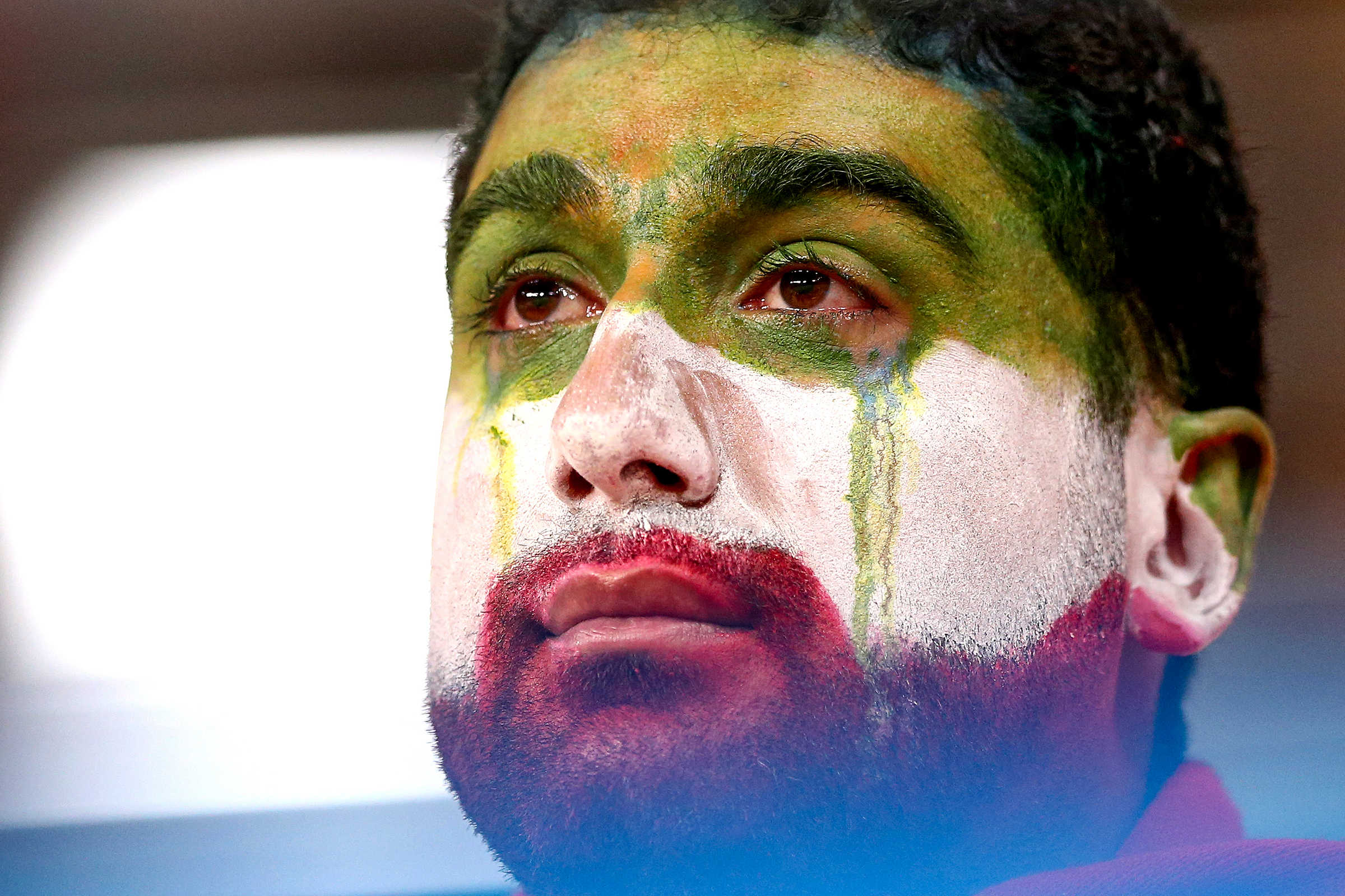 25 июня. Болельщик сборной Ирана после матча Иран &mdash; Португалия, который закончился со счетом 1:1.​
