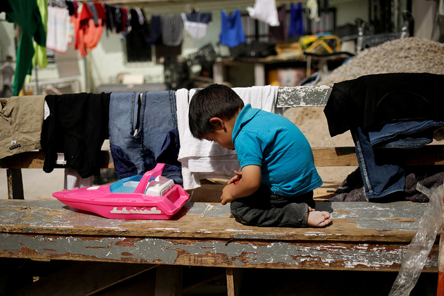 Ребенок, чья семья была депортирована из США, в приюте в Сьюдад-Хуаресе, Мексика, 21 марта